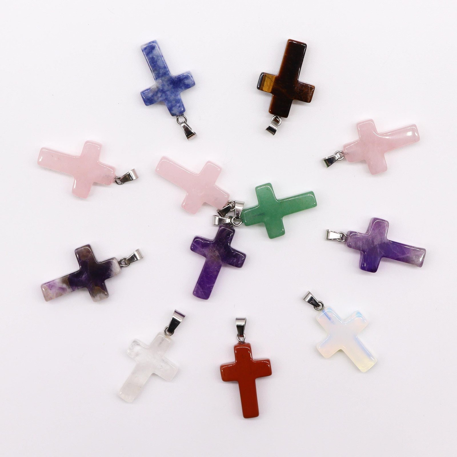 bG9jYWw6Ly9tZWRpYS8xSy8wQy82MFIzMEMxRzZXU0swQzFLL2FjZDliMjdkLmpwZWc.jpg Gemstone Crosses Pendants (12 assorted) 25x18mm - Image 1